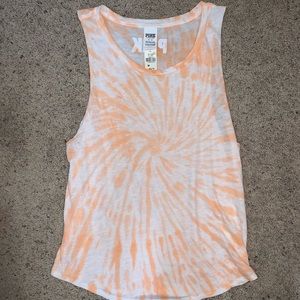 2 Victoria’s Secret tank tops.